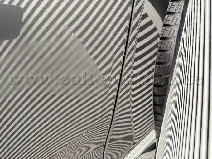 Tür vorne links Delle mit
Lackschaden