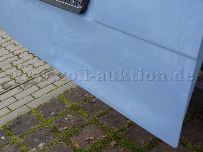 Unfallschaden Heckklappe unten rechts