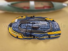 Übersicht Schlauchboot mit Paddel und Pumpe