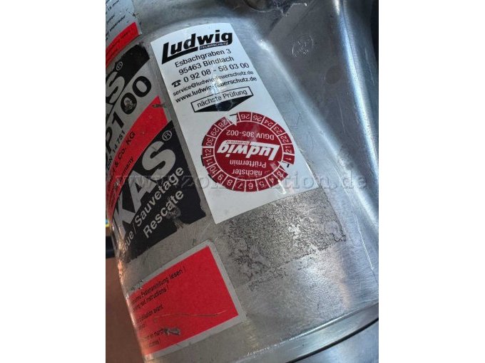 Detailaufnahme (Prüfplakette) Spreizer