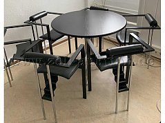Schwarzer runder Besuchertisch mit 6 Stühlen