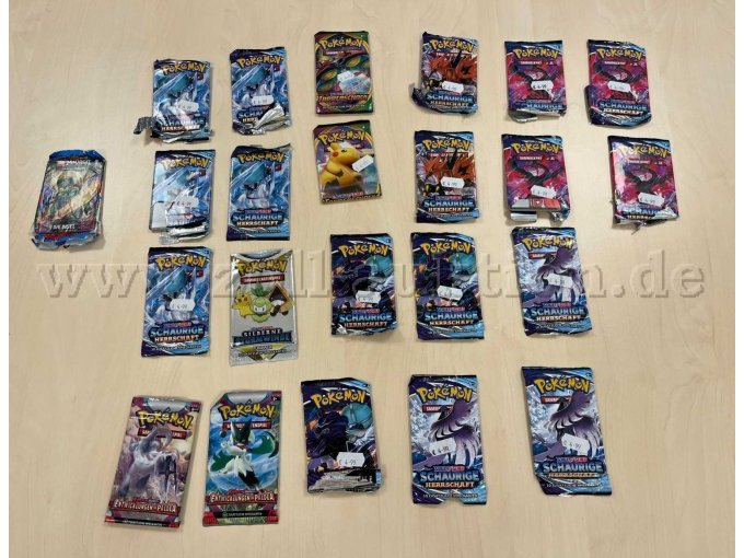 Übersicht: 1 x Lego Ninjago-Sammelkarten und 22 x Pokémon-Booster Packs