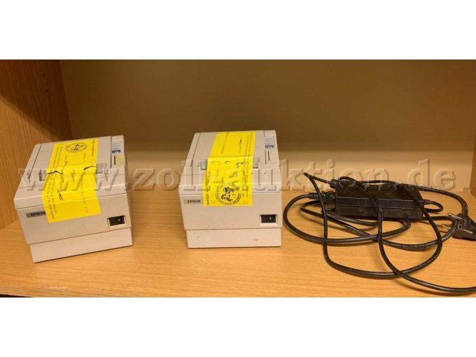 2 Epson Thermodrucker und ein Spannungsnetzteil mit Anschlusskabel