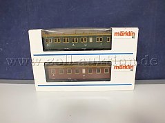 Gesamtansicht der Auktion Märklin Schnellzugwagen 4210 und 4211 K.W.St.E. - Königlich Württembergische Staatseisenbahn mit Beschädigung am Blister