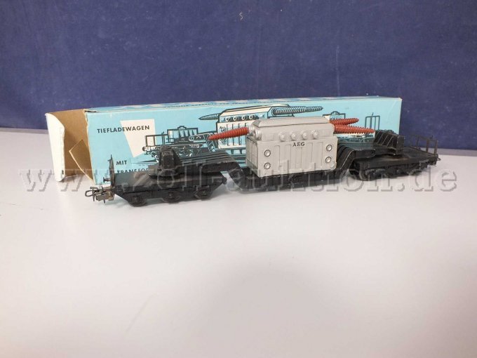 Tiefladewagen 1 mit Transformator und beschädigter / fehlender Transformatorspulen