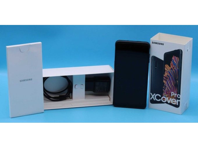 Originalverpackung mit Handy, Ladekabel