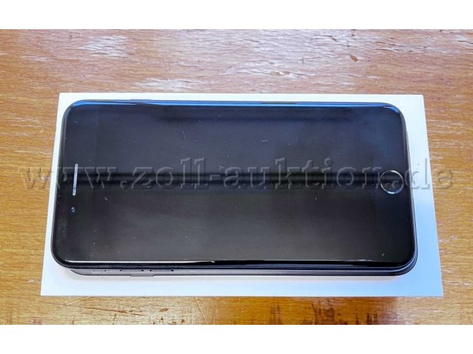 Ansicht Vorderseite Smartphone, leichte Kratzer auf dem Display, leichte Farbabplatzungen oben und unten am Rahmen