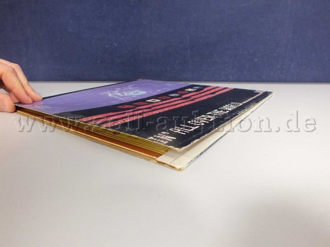 Beschädigung an der Hülle der LP "Rockin' All Over The World"