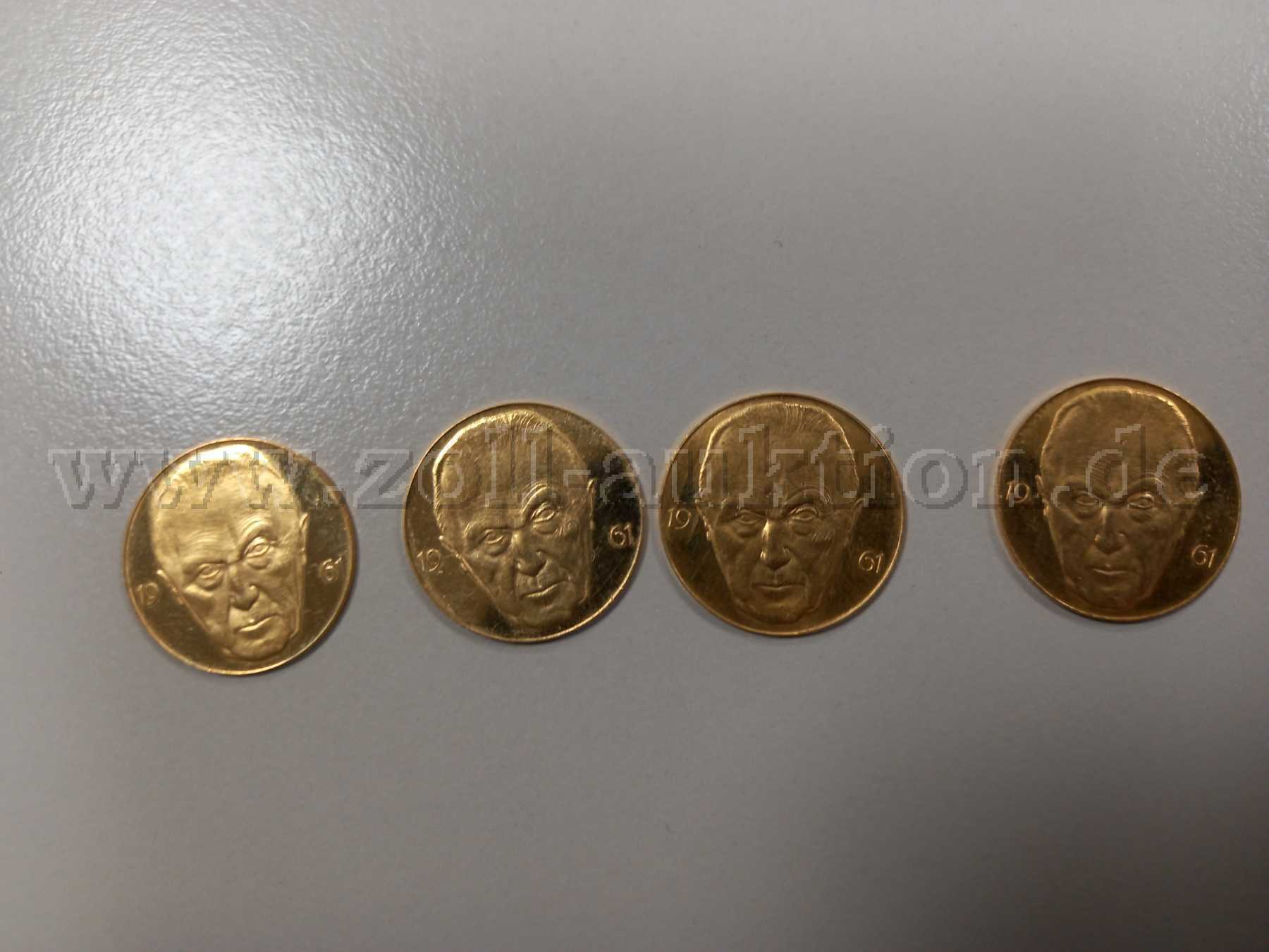 Goldmünzen mit dem Porträt von Konrad Adenauer