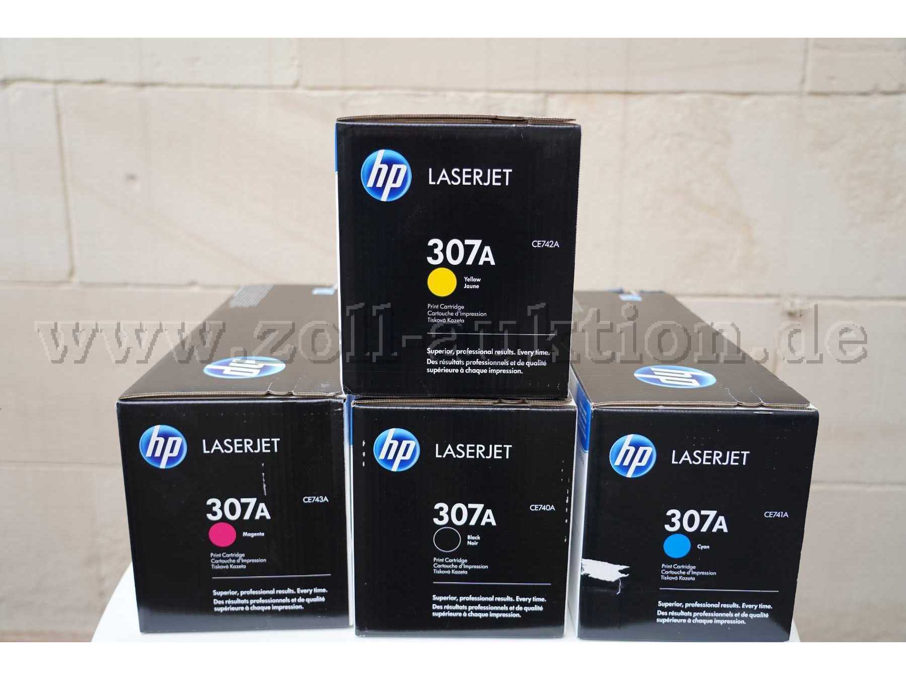 Toner in den Farben gelb, rot, schwarz und blau.