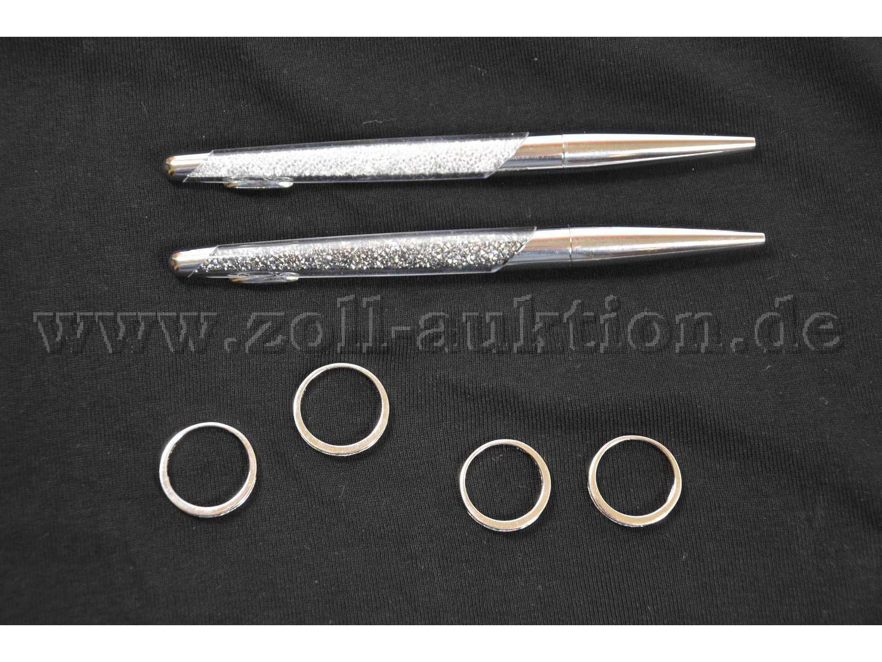 4 Ringe 925er Silber und 2 Kugelschreiber „Swarovski“